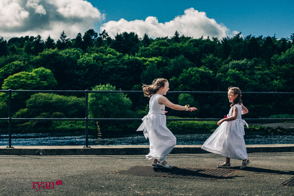 flower girls playing by the river moy at the ice house in ballina