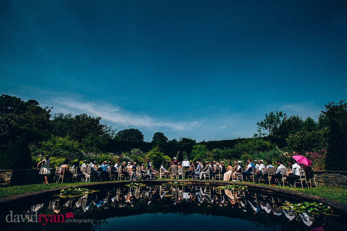outdoor garden wedding by pond